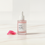RHÉVA peptide & PDRN active serum bottle on white background with Pink flower 
