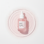 RHÉVA peptide & PDRN active serum bottle on white background with Water Ripple